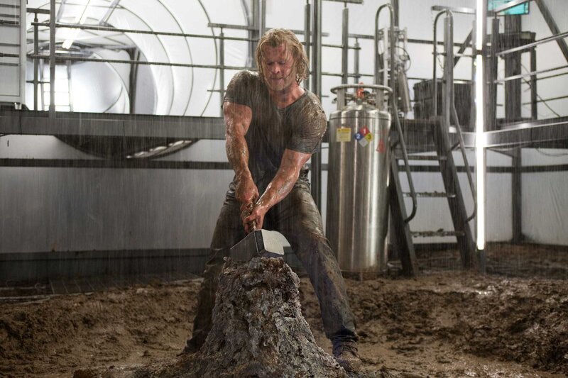 Thor lifting Mjolnir in rain