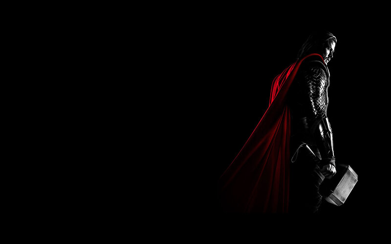 Thor with red cape and hammer