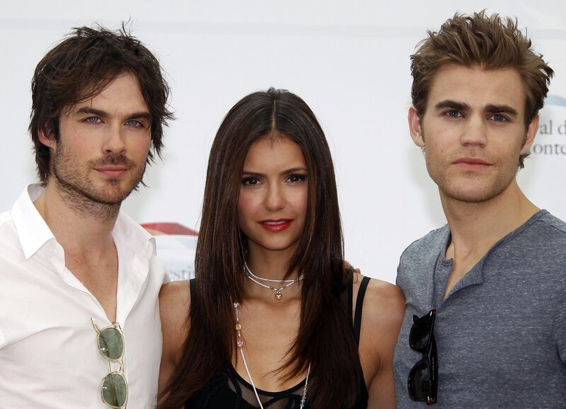 Three actors at a promotional event