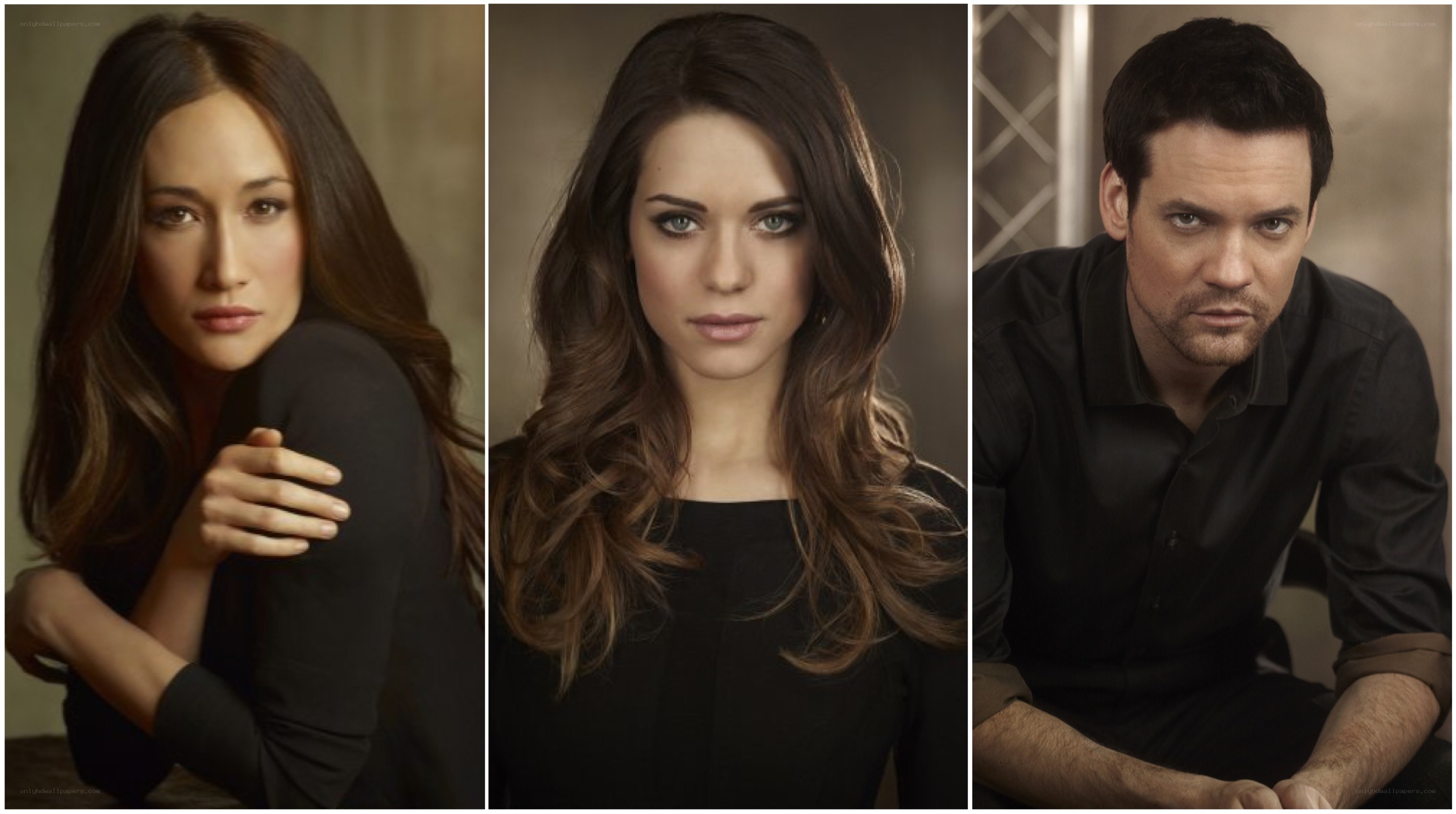 three actors in black attire
