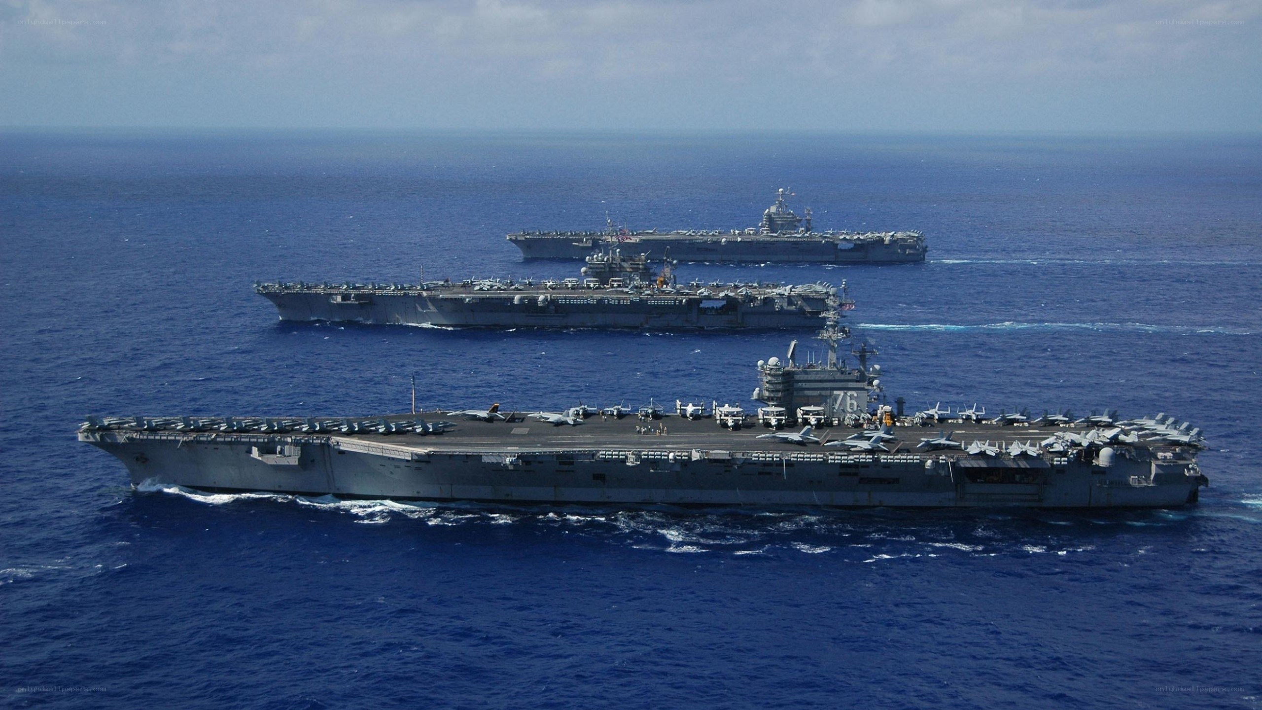 Three aircraft carriers at sea