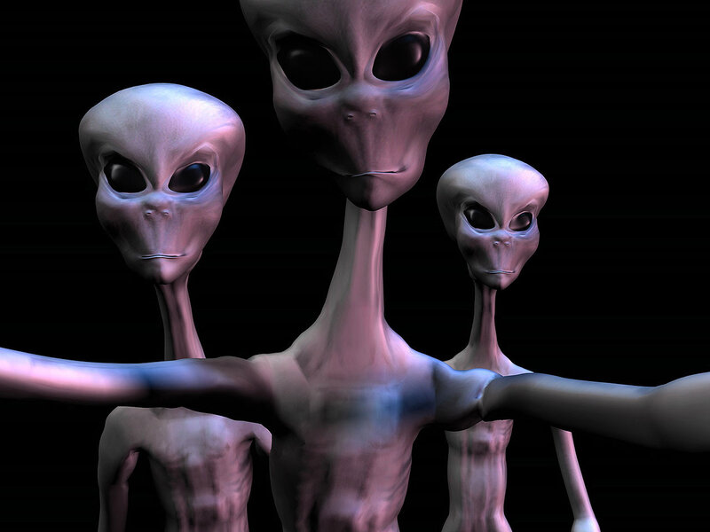 three alien figures in a group