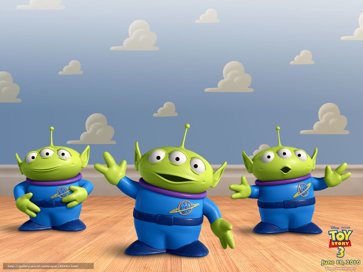 Three Alien Toys on Floor