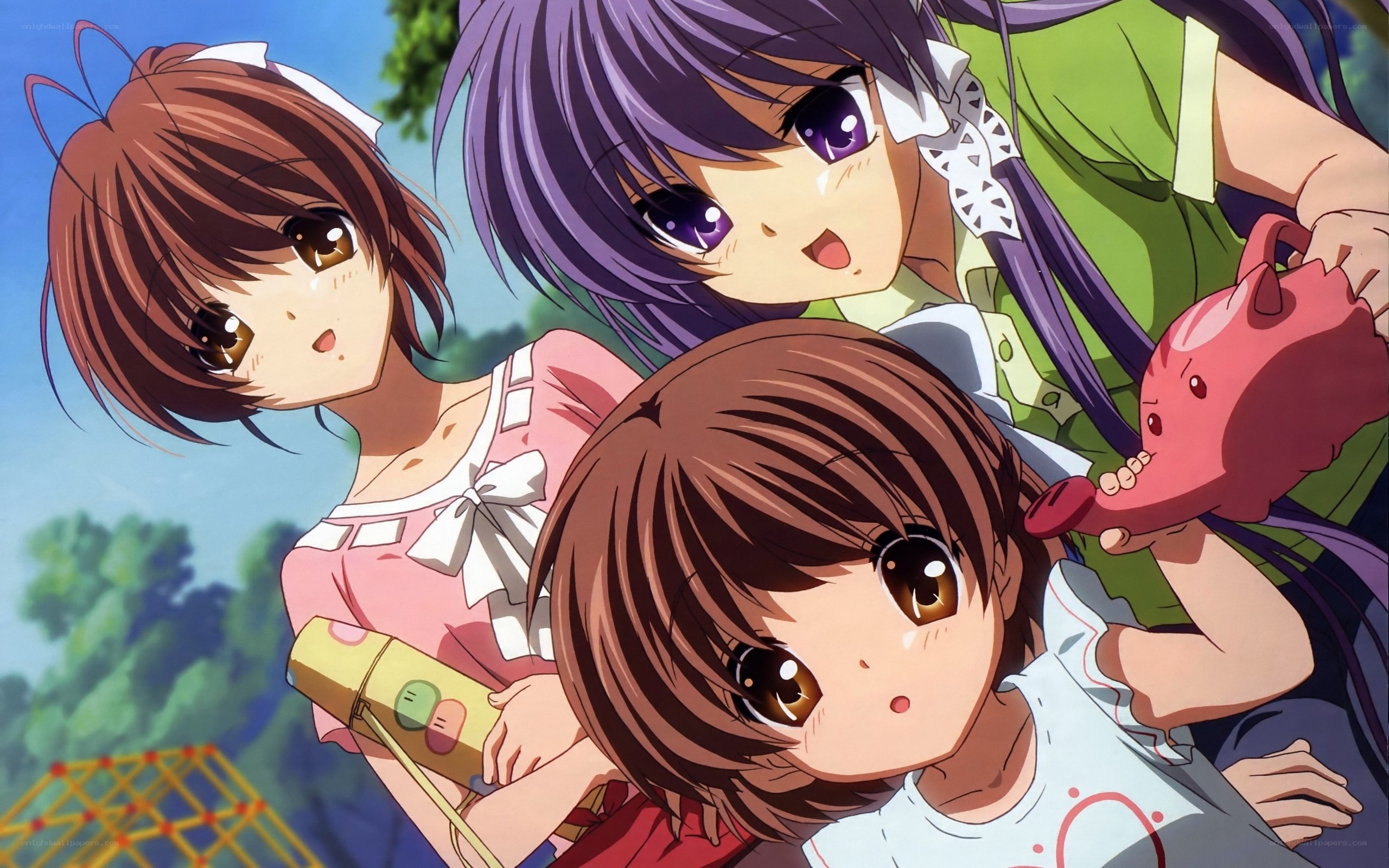 three anime girls at a park
