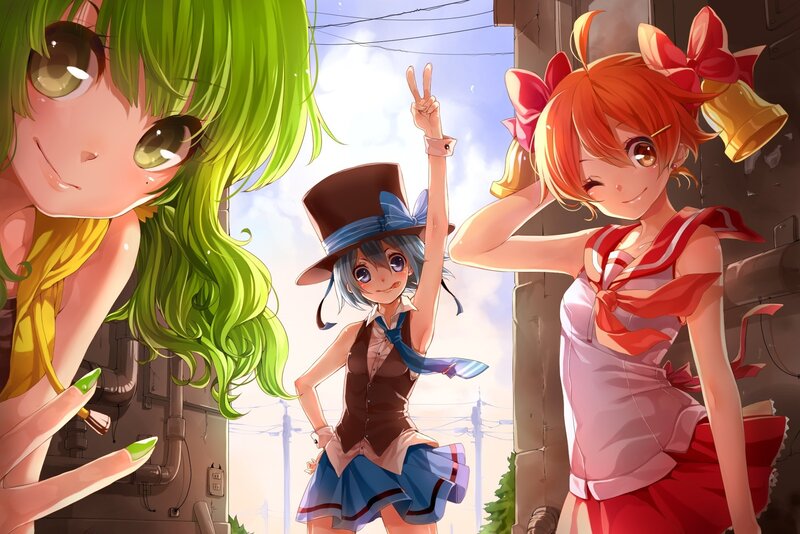 Three anime girls in a city