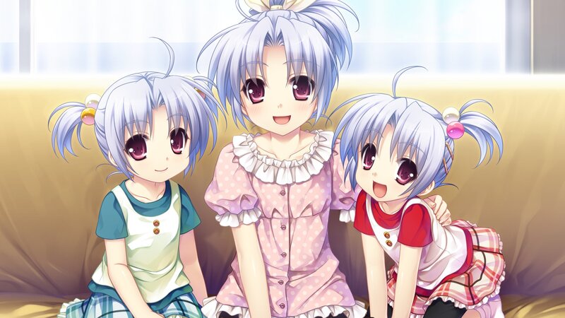 Three anime girls on a couch