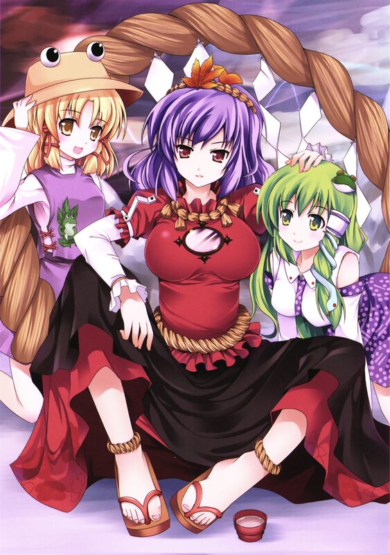 three anime girls sitting together