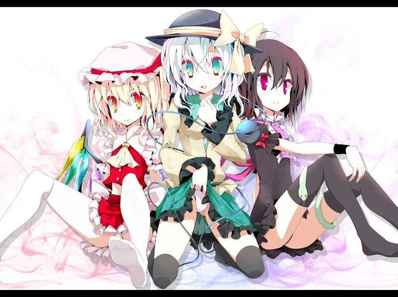 three anime girls sitting together