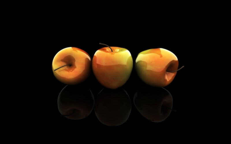 Three Apples on Black Surface