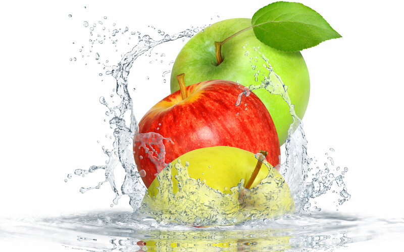 Three Apples Splashing Water
