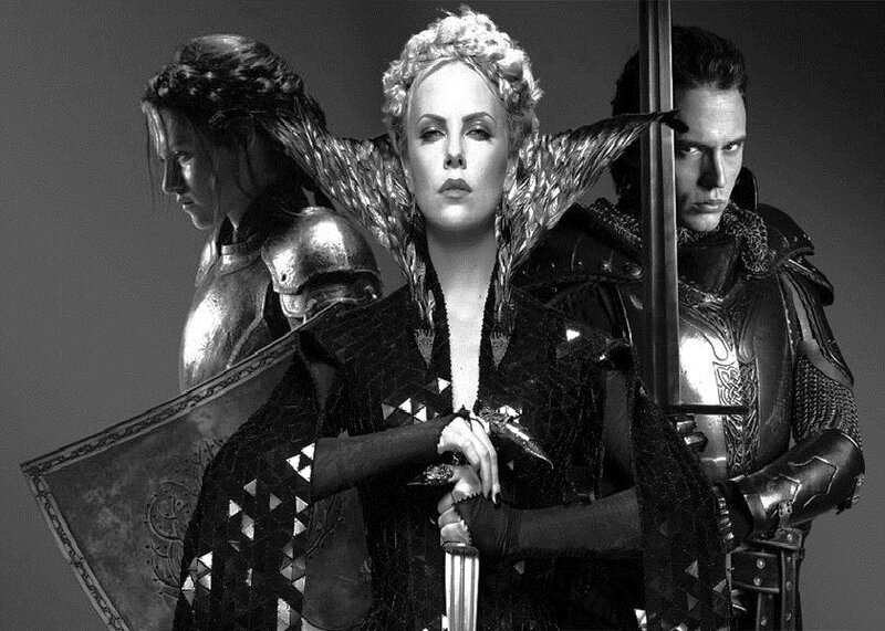 Three Armored Figures — Black, Dramatic