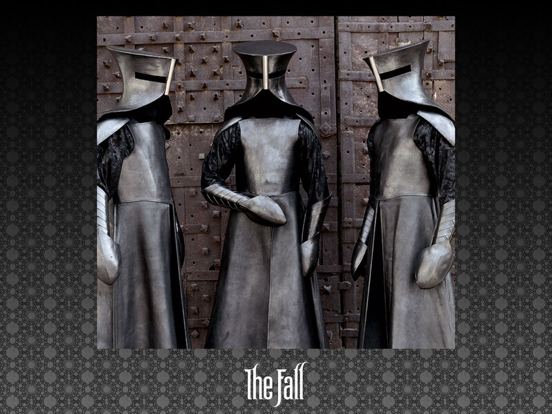 Three armored figures in armor
