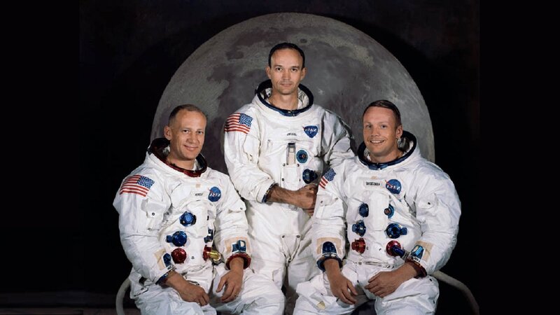 Three Astronauts in Spacesuits — White