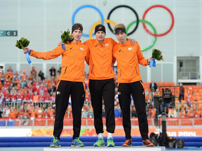 Three Athletes on Podium