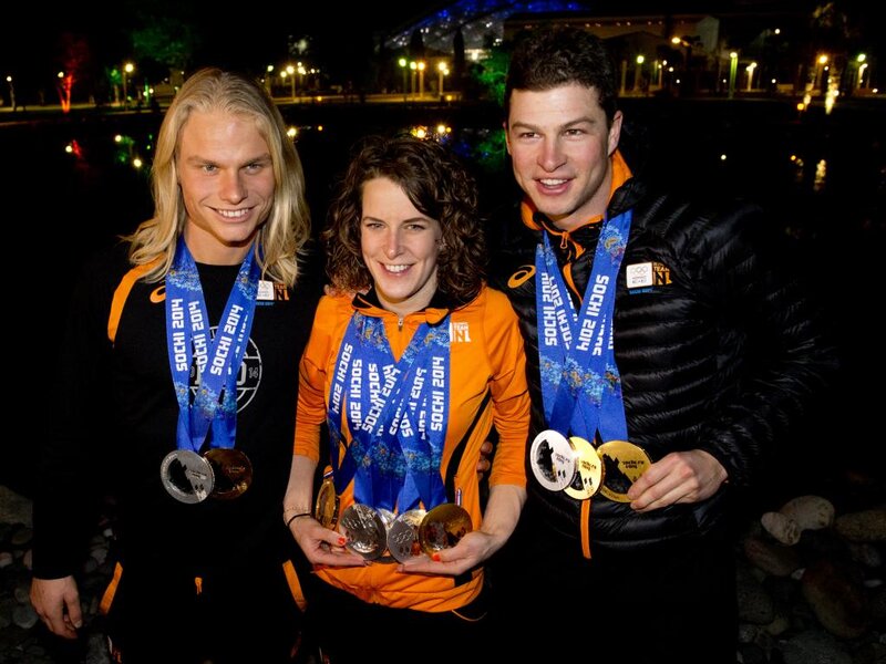 Three Athletes with Medals — Black