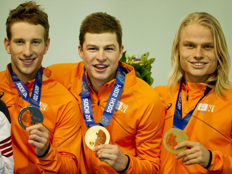 Three Athletes with Medals — Orange
