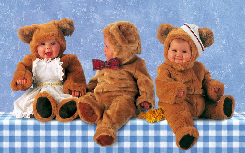 Three Babies in Bear Costumes