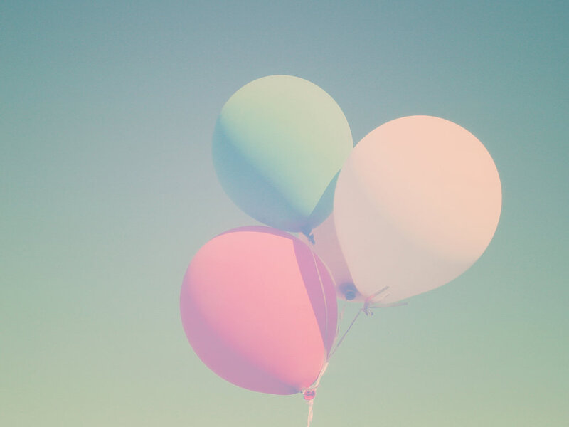 Three Balloons Floating