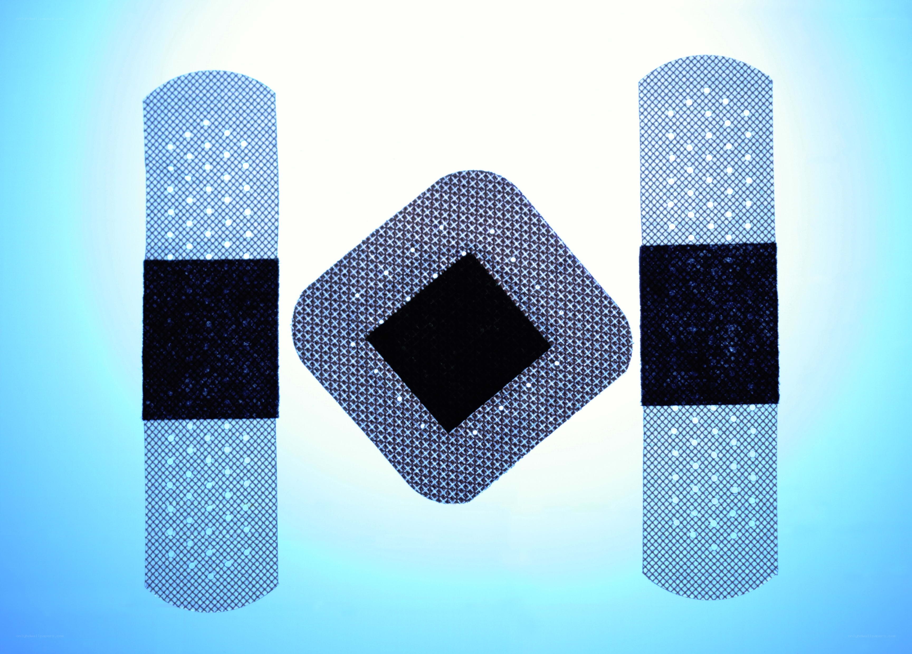 three bandages on blue