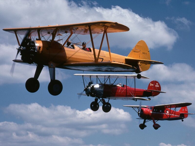 Three biplanes in formation flight