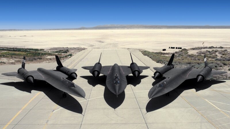 Three Black Jets on Tarmac — Serene, Afternoon