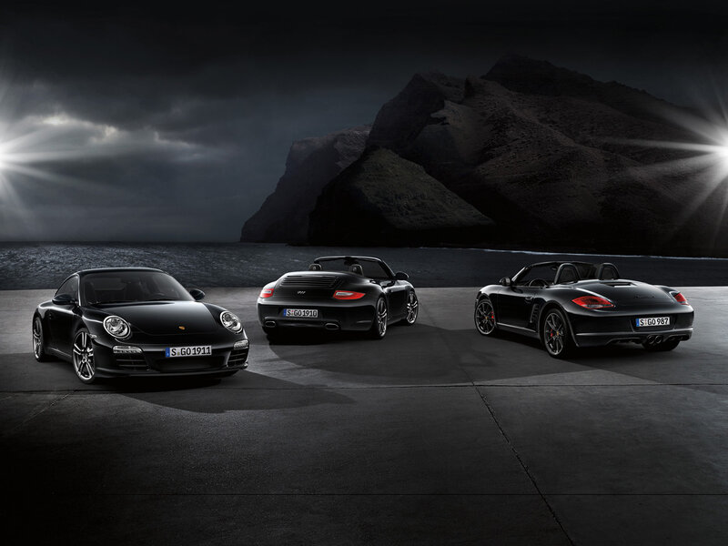 Three Black Sports Cars