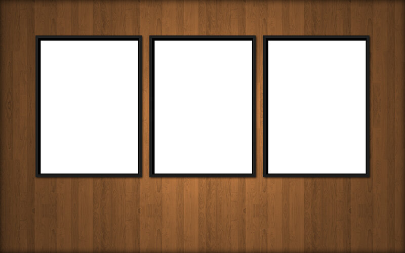 three blank frames on wood wall