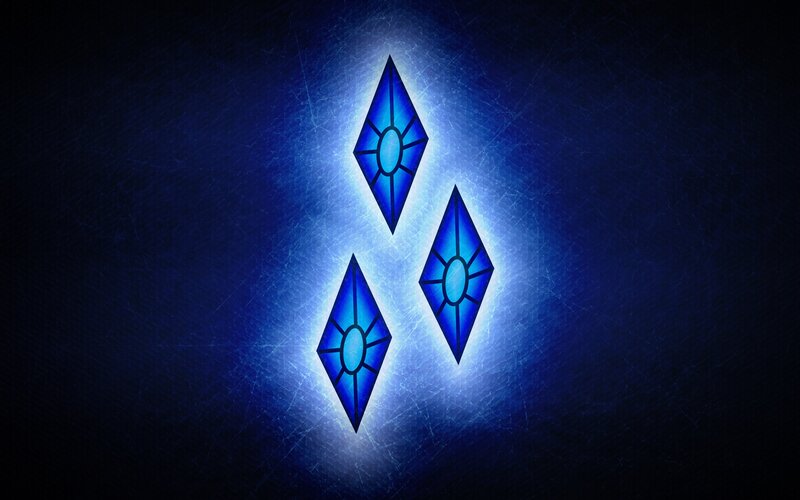 three blue crystals glowing