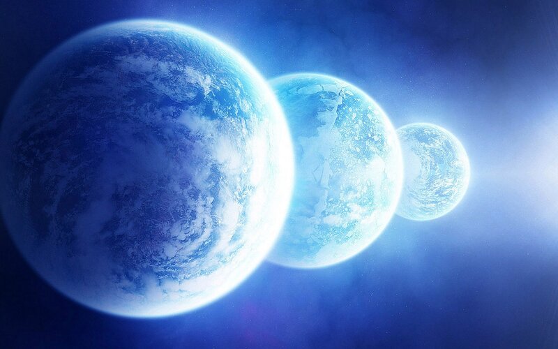 Three blue planets in space