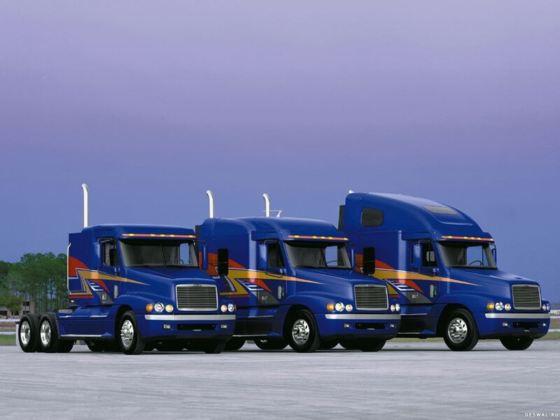 Three Blue Semi-trucks