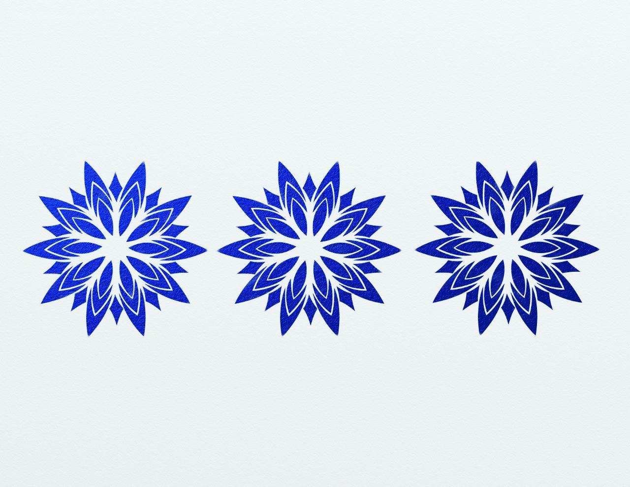 three blue snowflake designs
