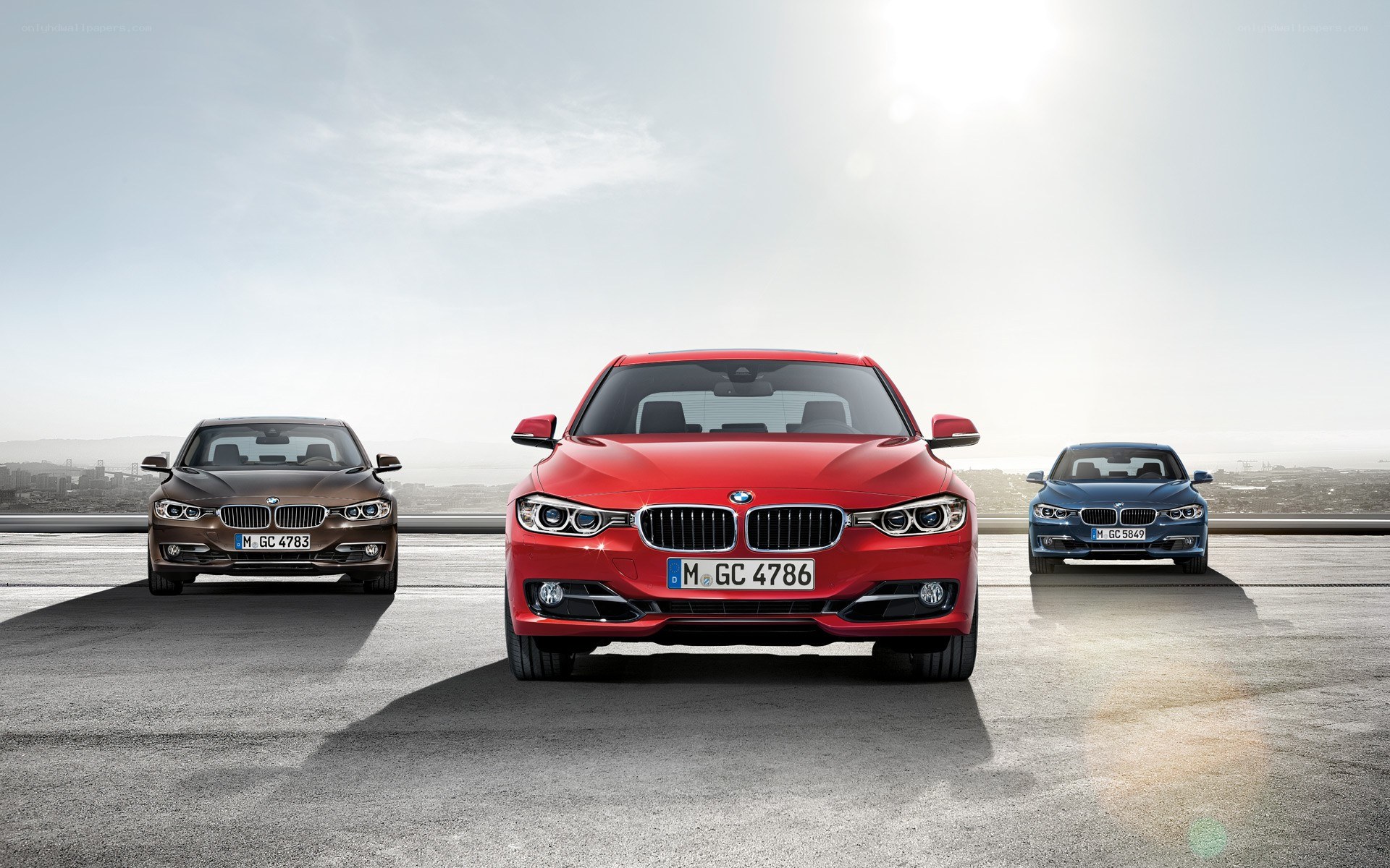 Three BMW 3 Series cars