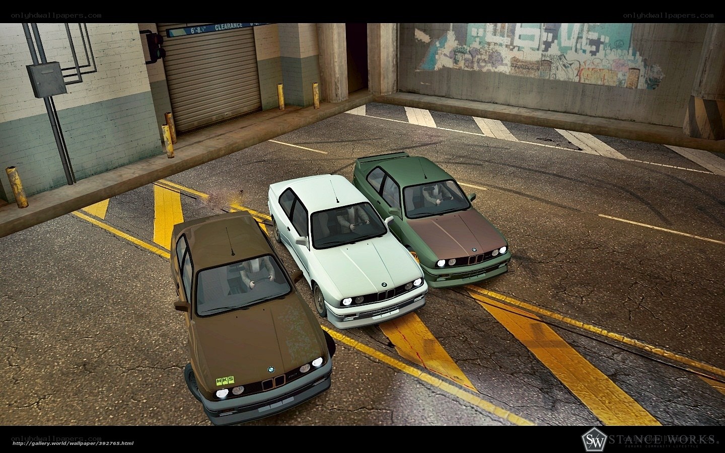 Three BMW cars in a parking lot