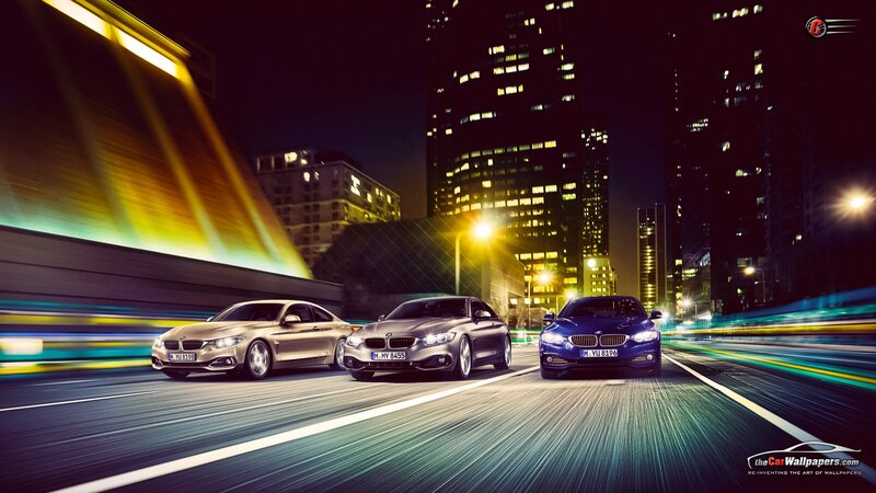 Three BMW Cars on Road