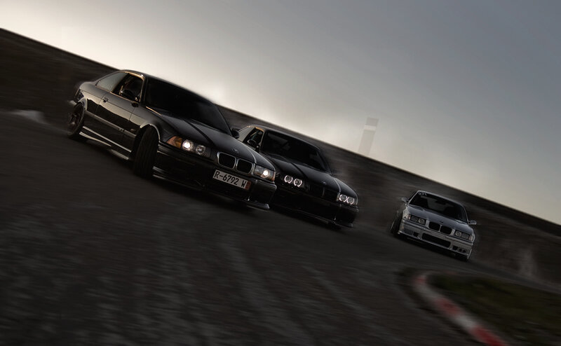 three bmw cars racing