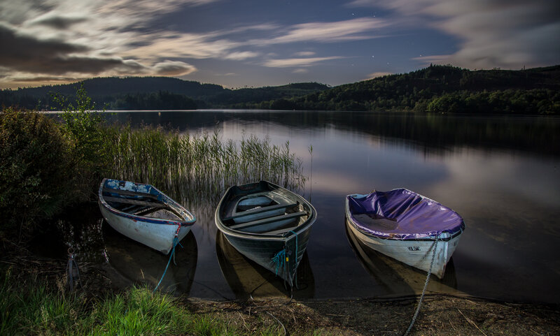 Three Boats on Lake Shore