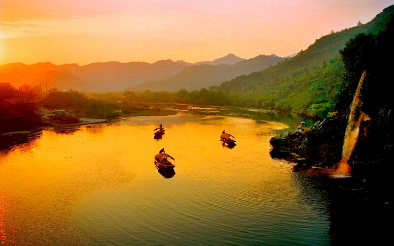 Three Boats on River