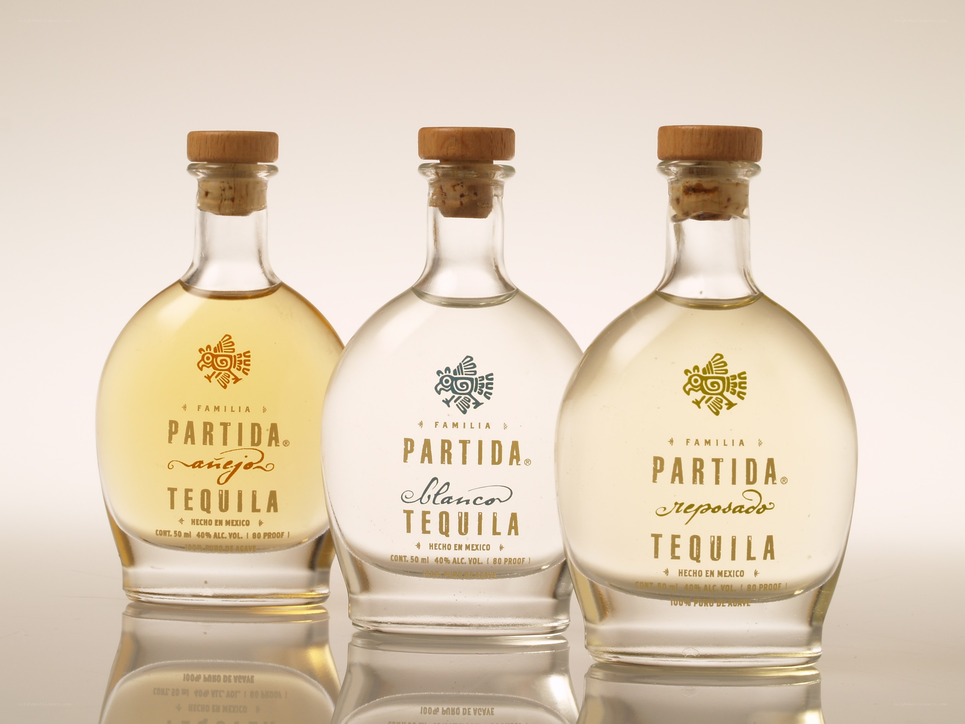 Three bottles of Partida Tequila