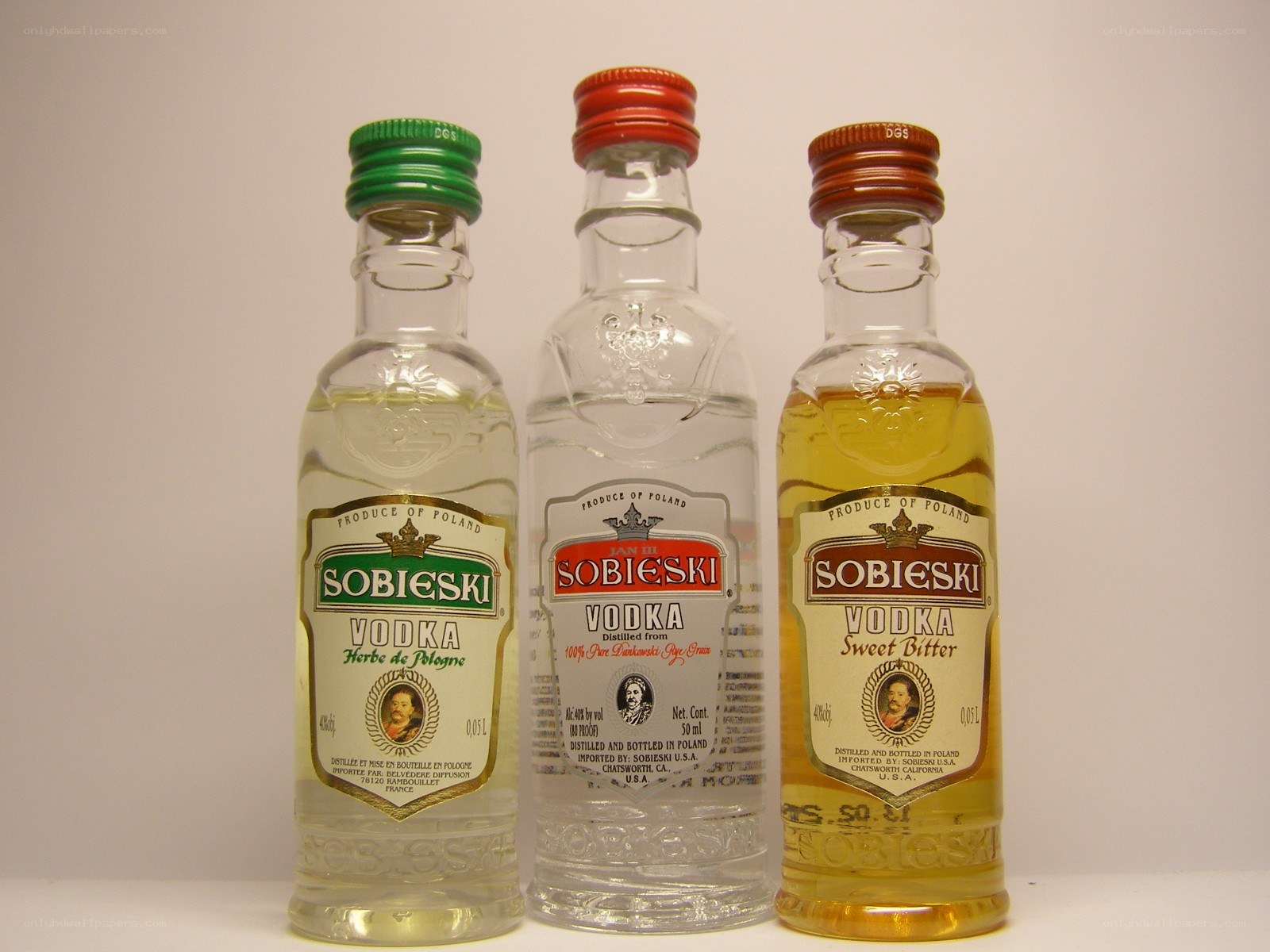 Three bottles of Sobieski vodka
