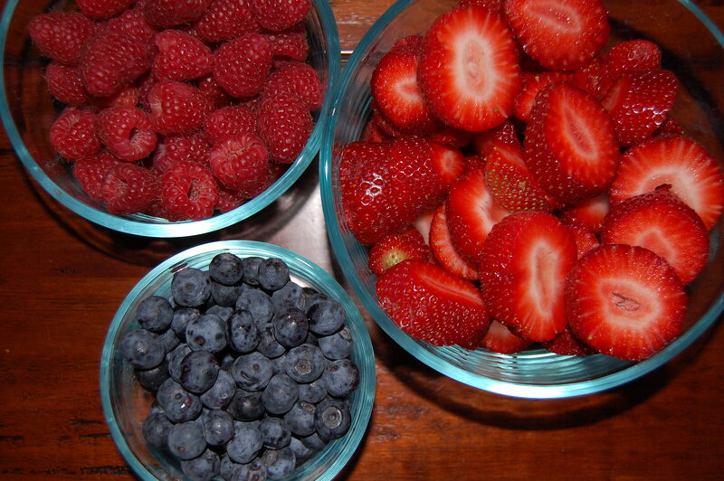 Three bowls of fresh berries