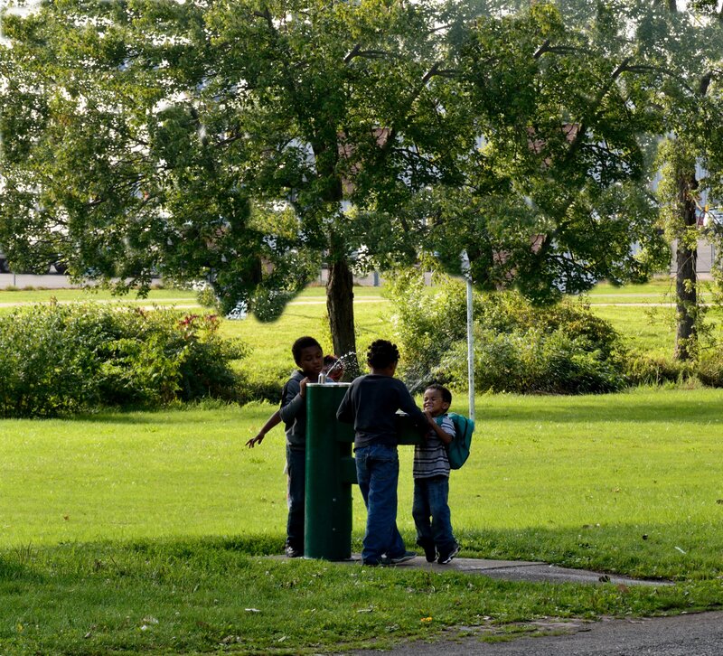 Three Boys at Water Fountain