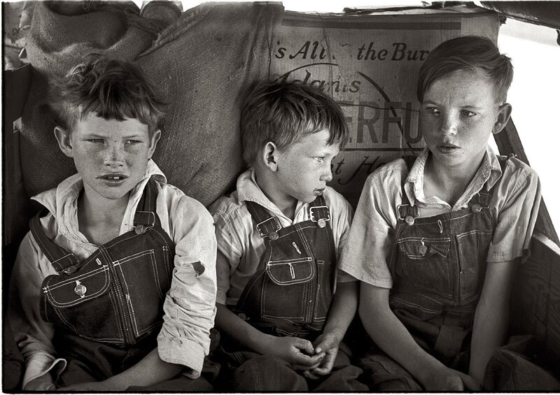 Three boys in overalls