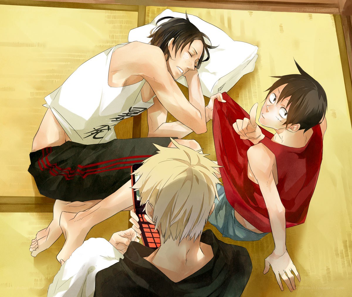 Three boys on a futon