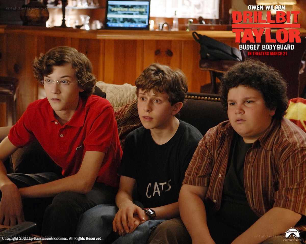 three boys watching TV