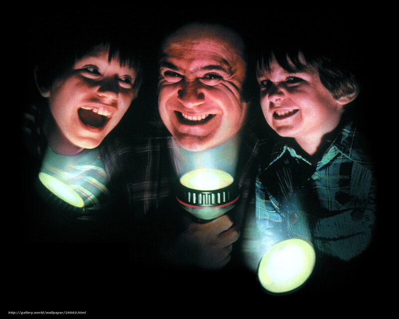 Three boys with flashlights