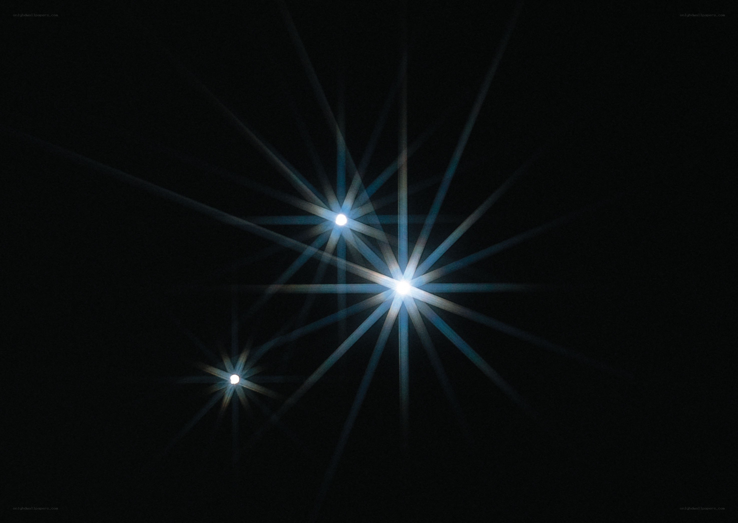Three bright stars in night sky