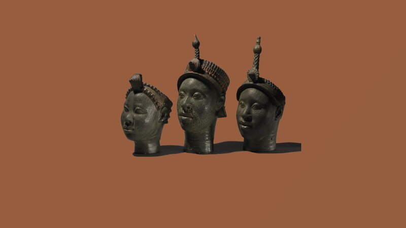Three Bronze Heads — Brown