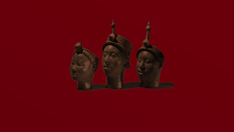 Three Bronze Heads — Red, Dramatic