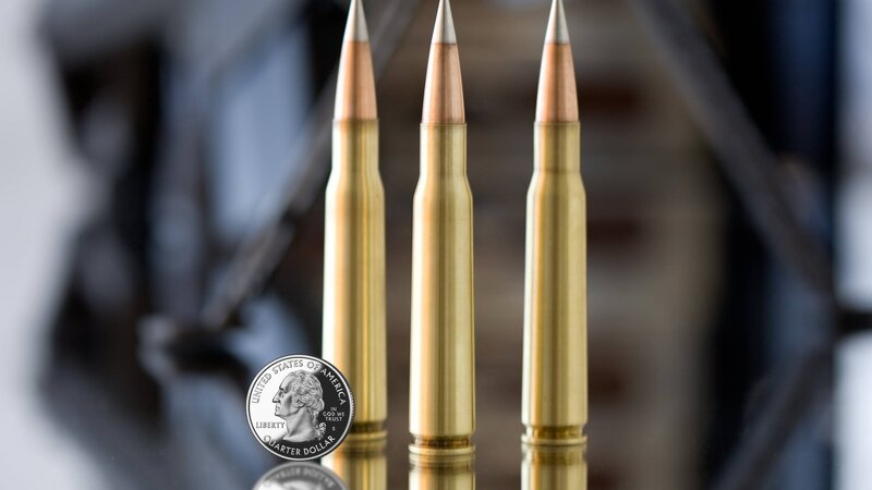 Three Bullets and a Coin — Gold