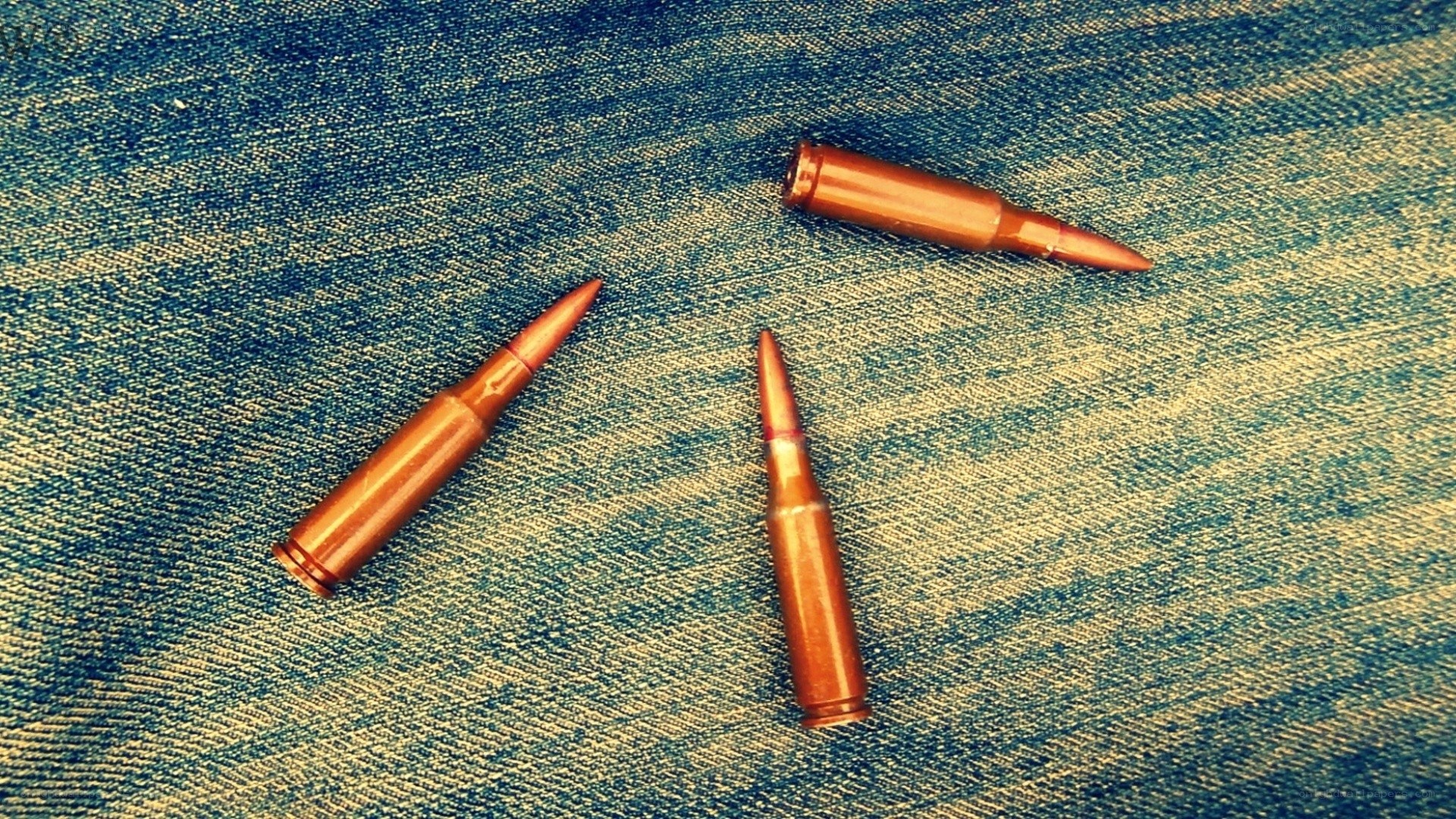 Three bullets on denim